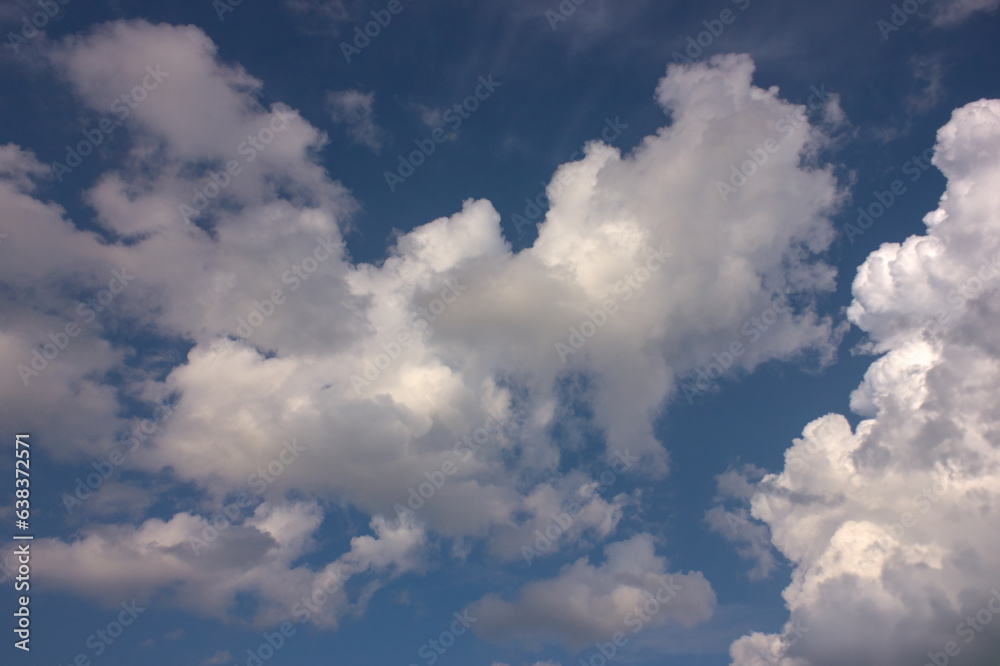 Summer evening sky in the picturesque clouds, lit by the rays of the setting sun. Summer evening sky in the picturesque clouds, lit by the rays of the setting sun.
