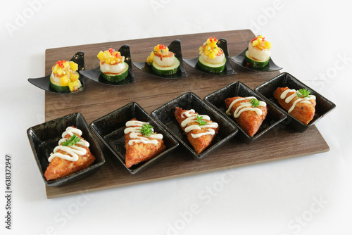 mini bites scallop mango salad and bbq prawn paste bread canapés butler in small plate in white background appetiser Christmas festival party halal food hotel cuisine restaurant menu