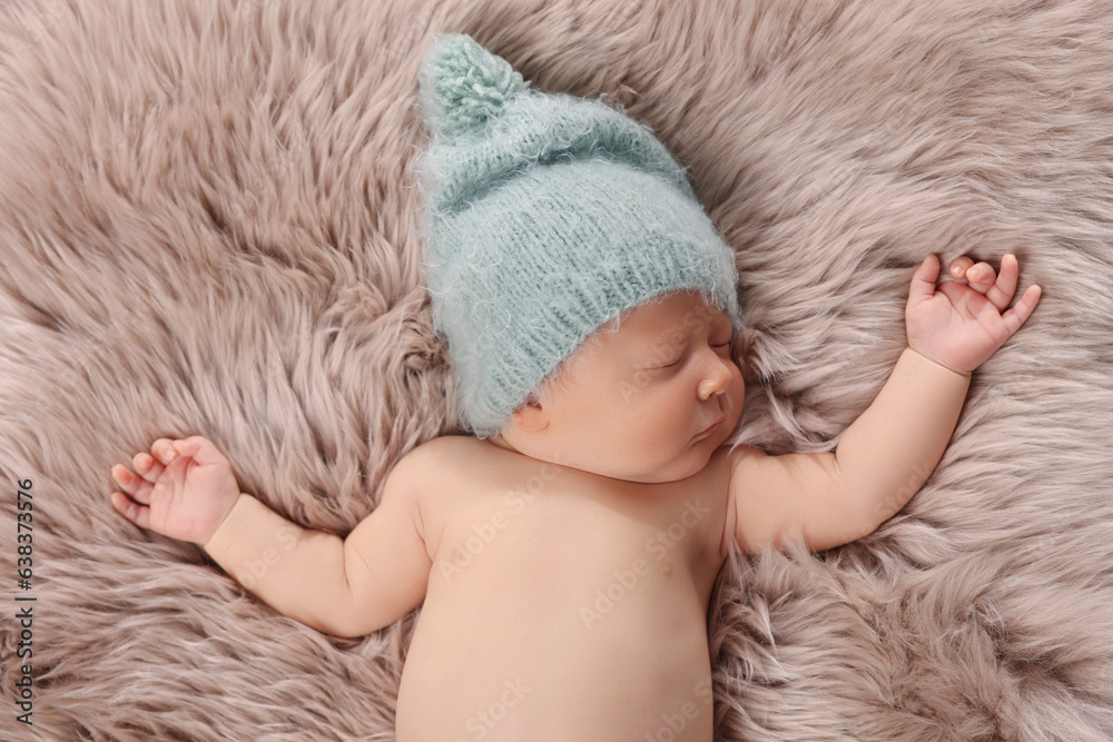 Cute newborn baby sleeping on fluffy blanket, top view Cute newborn baby sleeping on fluffy blanket, top view