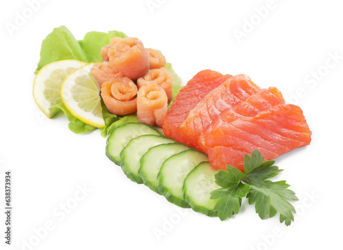 Delicious salmon sashimi served with lemon, cucumbers, parsley and lettuce isolated on white