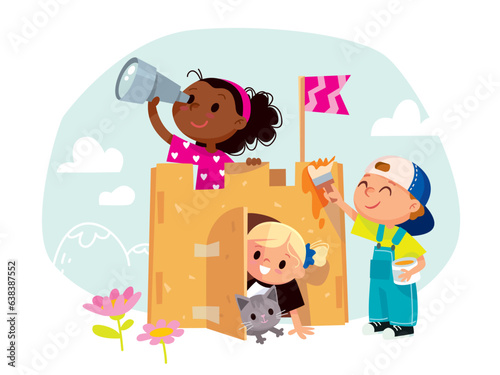 Kids play together. Children with a cardboard castle. Girls and boy create a castle. Happy creative kids spare time together.