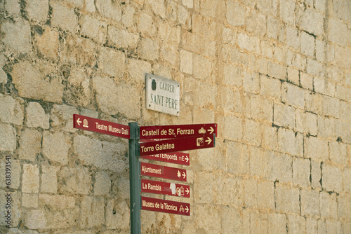 Landscape of signs outside of Theater Museum of Salvador Dali in Figueres Catalonia