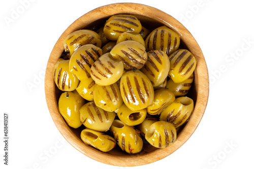 Grilled olives at wooden bowl. Grilled green olives isolated on white background. Mediterranean food. vegan food. Top view