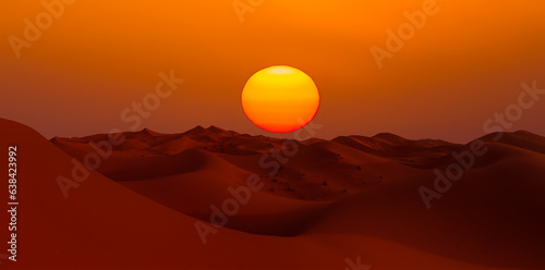 Sand dunes in the Sahara Desert at amazing sunrise, Merzouga, Morocco - Orange dunes in the desert of Morocco - Sahara desert, Morocco