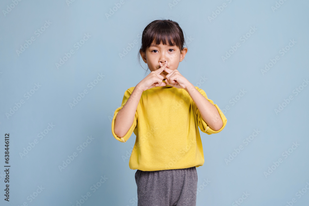 A little girl is doing crossed hands, showing rejection A little girl is doing crossed hands, showing rejection