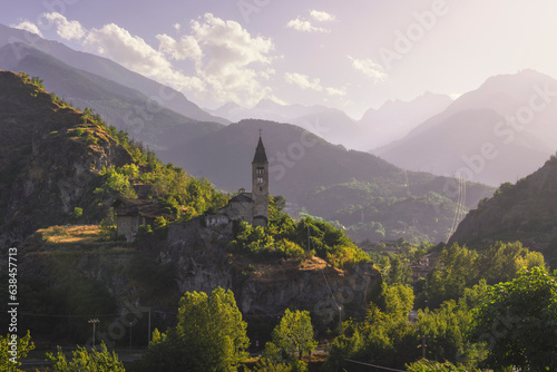 Fototapeta Naklejka Na Ścianę i Meble -  Santa Maria Assunta church on the rocks. Saint Roch, Villeneuve. Aosta valley, Italy