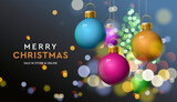 Christmas sale banner with baubles sparkle in blur bokeh effect background