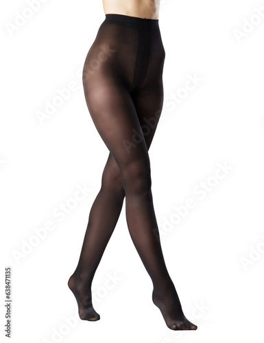 Legs of a woman in black capron tights on white background