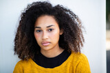 Close up beautiful young african american woman with curly hair