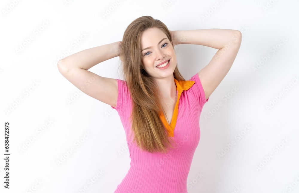 young beautiful red haired woman stretching arms, relaxed position. young beautiful red haired woman stretching arms, relaxed position.