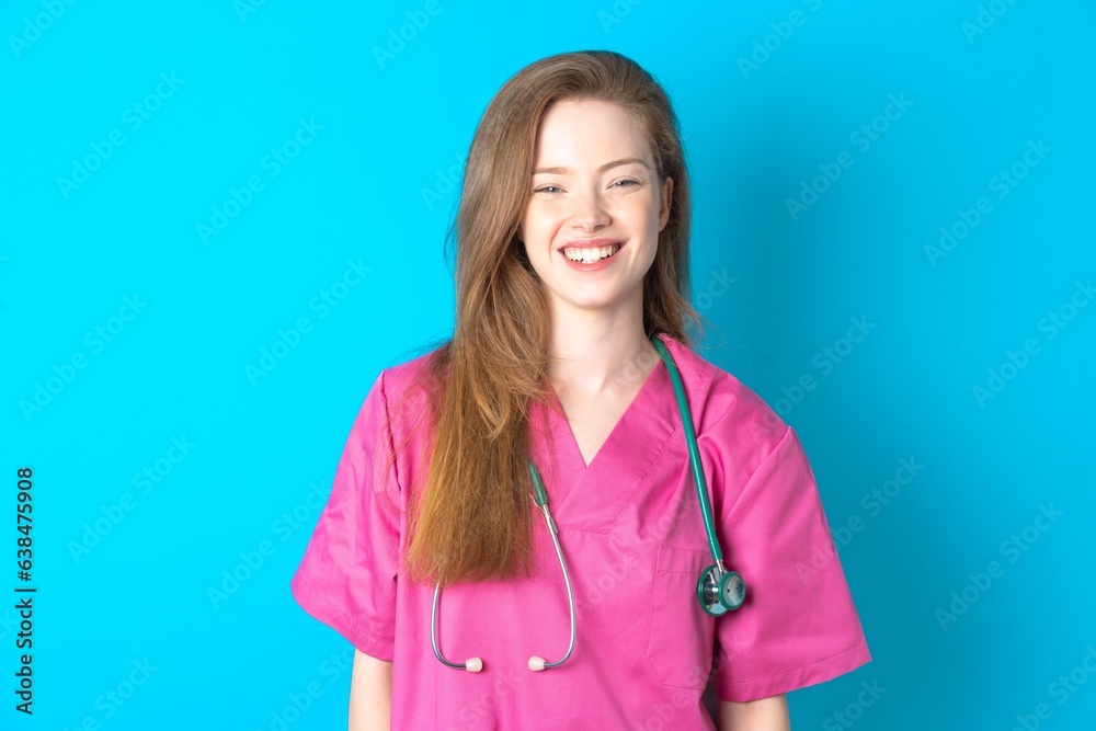 young beautiful red haired doctor woman with a happy and cool smile on face. Lucky person. young beautiful red haired doctor woman with a happy and cool smile on face. Lucky person.