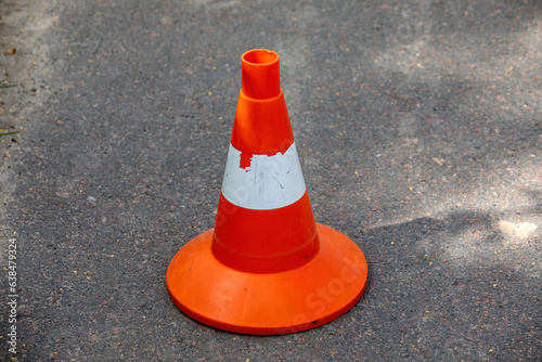 Road warning plastic orange chip. Carefully.