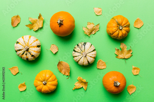 Autumn composition. Pattern made of dried leaves and other design accessories on table. Flat lay, top view