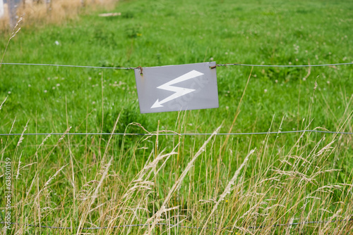Canvas Print sign on grass electrify fence