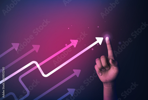 Hand pointing at business and investment arrow.