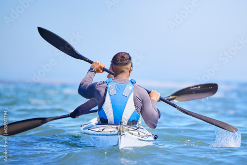 Water, man and woman in kayak from back and sports on lake, beach or river for exercise team. Ocean holiday, adventure and fitness, couple in canoe for training workout with teamwork in travel on sea