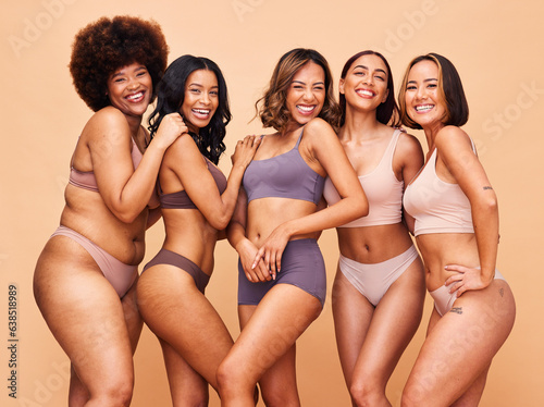 Self love, diversity and portrait of women in studio in underwear for wellness, beauty and body positive. Lingerie campaign, natural and people on brown background for pride, skincare and inclusion © Anela/peopleimages.com