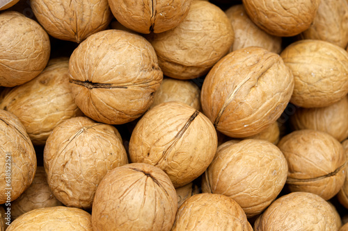  a lot of delicious pile of walnuts closeup 