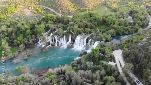 Konjic and river Neretva, Bosnia and Herzegovina, aerial drone view. Konjic is a city and municipality in BiH. Mountain Prenj in distance. photo