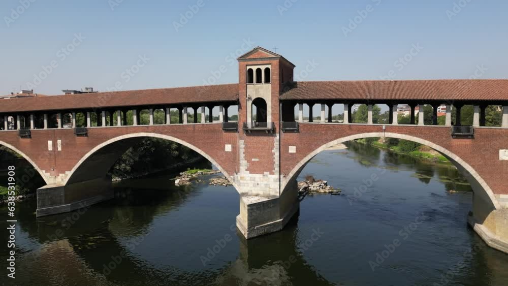 Europe, Italy , Pavia - Drone aerial view of Pavia City in Lombardy with Ponte Coperto ( covered bridge ) on the Ticino and Po' river and during drought and summer aridity Europe, Italy , Pavia - Drone aerial view of Pavia City in Lombardy with Ponte Coperto ( covered bridge ) on the Ticino and Po' river and during drought and summer aridity