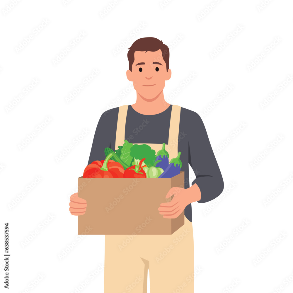 Farming and agriculture concept. Smiling male farmer or gardener in uniform holds basket of ripe vegetables and fruits. Work and harvest. Farming and agriculture concept. Smiling male farmer or gardener in uniform holds basket of ripe vegetables and fruits. Work and harvest.
