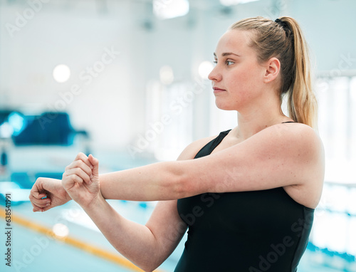 Swimmer, exercise and woman stretching, workout and wellness for competition, fitness and active lifestyle. Girl, athlete and person stretch arms, health and warm up with competitive sport and break