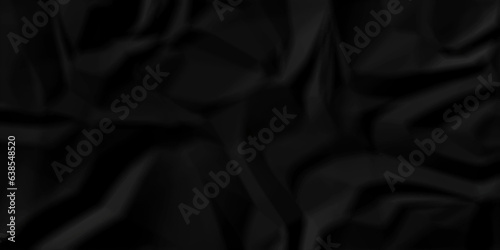 Black silk crumple black paper wrinkled poster template ,blank glued creased paper texture background. black paper crumled backdrop background. used for cardboard and clarkboard.