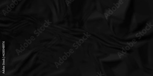 Black silk crumple black paper wrinkled poster template  blank glued creased paper texture background. black paper crumled backdrop background. used for cardboard and clarkboard.