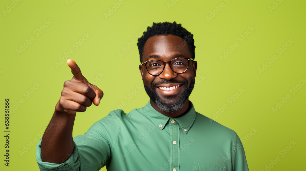 Middle aged man wearing casual clothes pointing with hand and finger to the side looking at the camera. - obrazy, fototapety, plakaty 