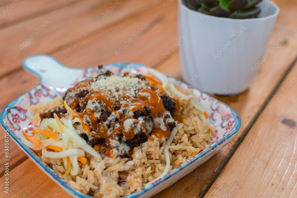 A serving of Beef shawarma and rice. Recipe combining the Middle