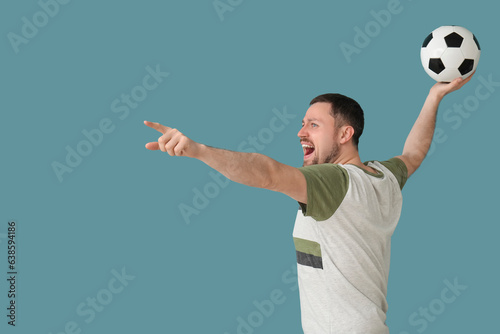 Screaming man with soccer b...