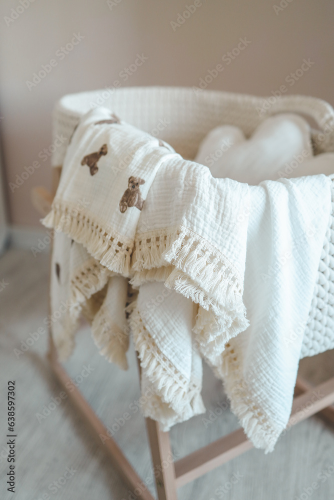 Muslin blanket on the cradle in the children's room Muslin blanket on the cradle in the children's room