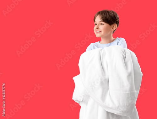 Little boy with blanket on ...