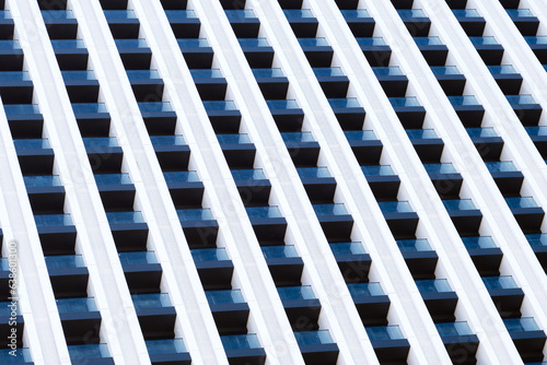 Close-up abstract background with beautiful geometry of windows and balconies.