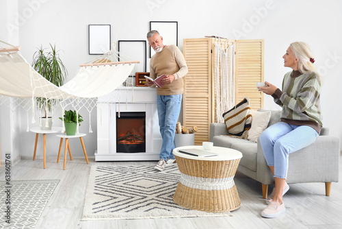Mature couple resting near ...