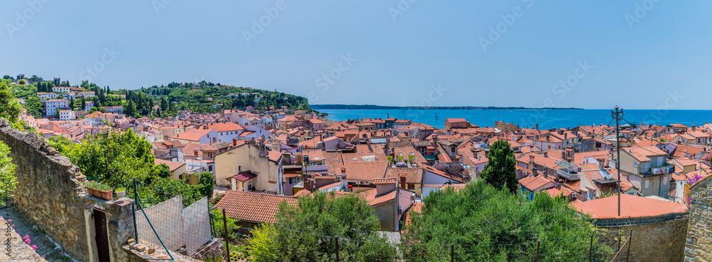 A panorama view from the base of the cathedral above the town of Piran, Slovenia in summertime