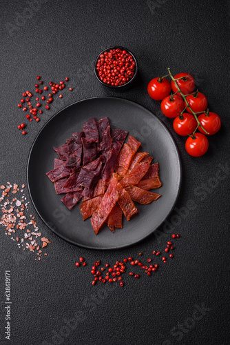 Delicious dried veal or turkey jerky with salt, spices and herbs