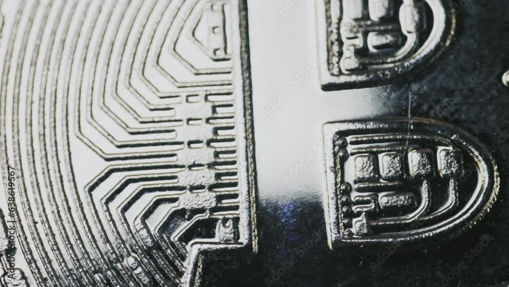 bitcoin coins lie on a dollar bill close-up