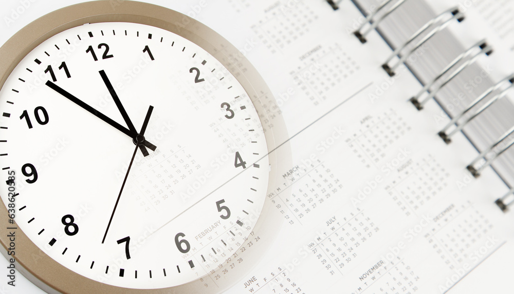 Time management. Clock face and calendar page Time management. Clock face and calendar page