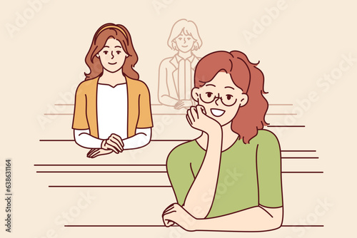 Girls university students sit in audience and listen to informative lectures to gain new knowledge on professional topics. Happy woman students enjoy studying at city college with amazing teachers