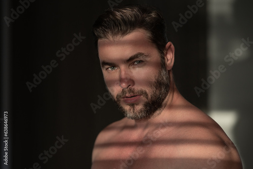 Close up portrait of handsome man. Portrait of shirtless man for skincare and beauty concepts. Handsome man with beauty face, facial skin portrait. Male healthy skin and spa concept.