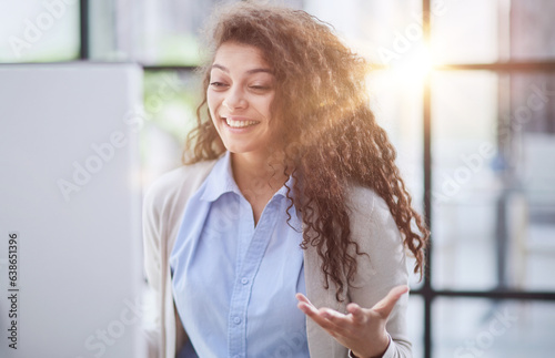 Emotional girl surprised with getting victory in online contest reading news from laptop computer