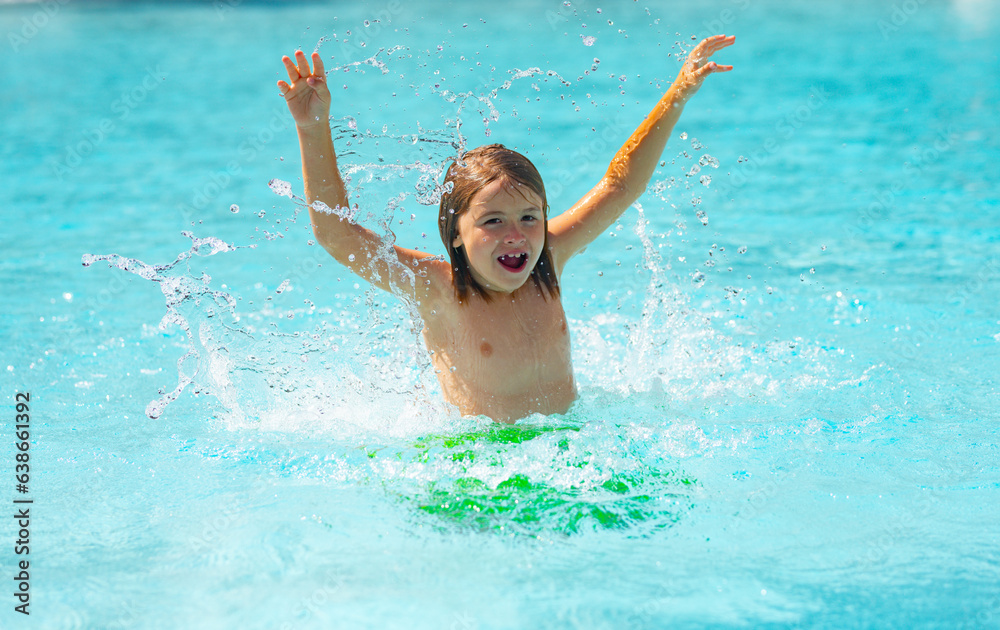 Child splashing in summer water pool. Kid splash in pool. Excited happy