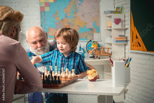 Wallpaper Mural Grandfather father and son child playing chess. Torontodigital.ca