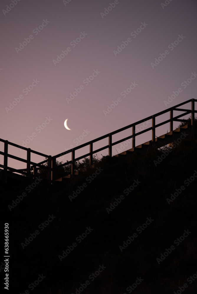 Crescent moon over the stairs