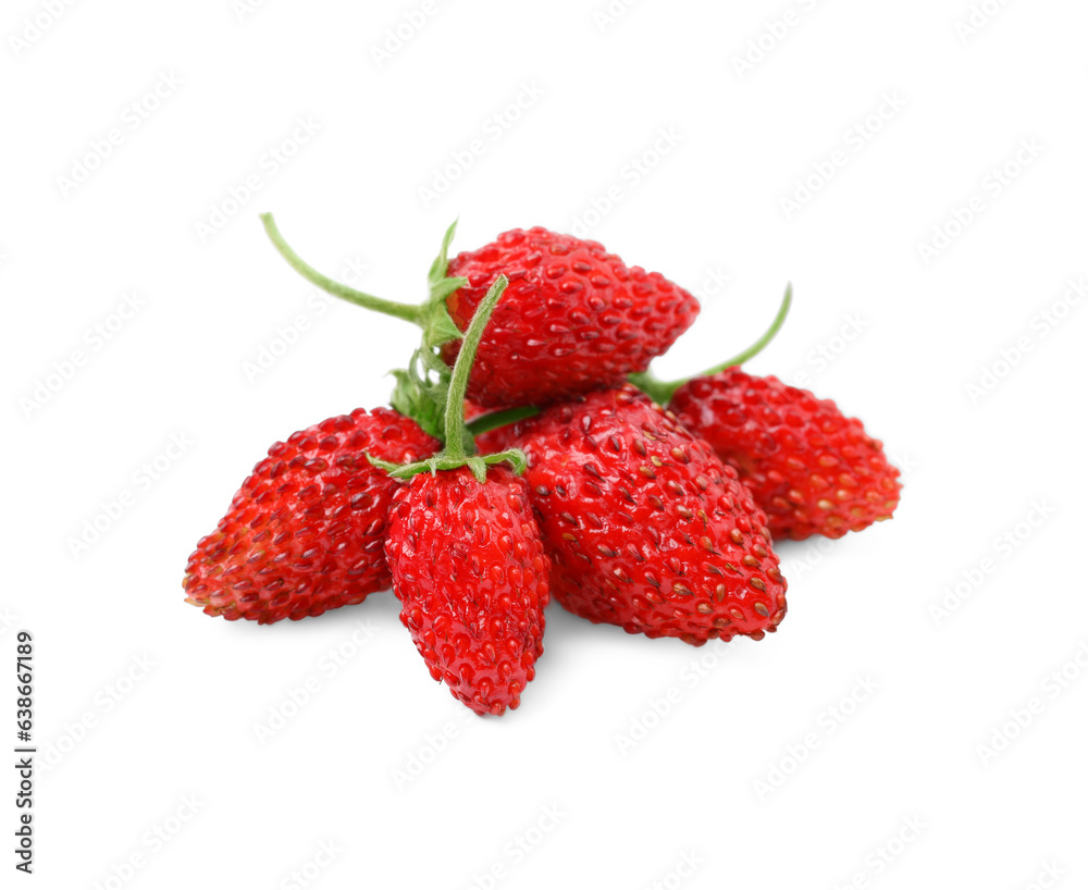 Ripe red wild strawberries isolated on white Ripe red wild strawberries isolated on white