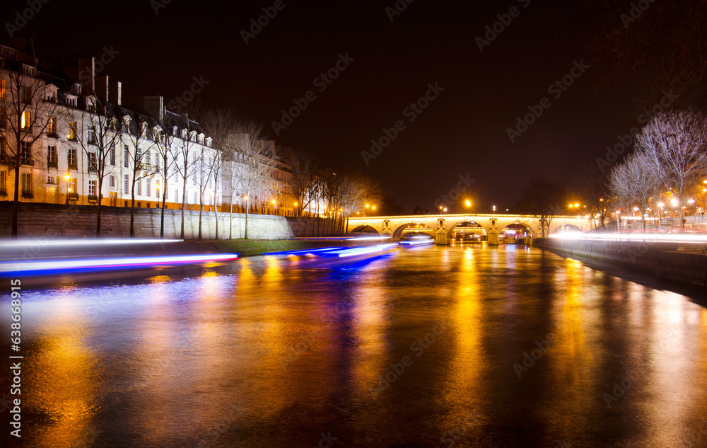 River Seine and Pont Marie bridge at night, Paris France