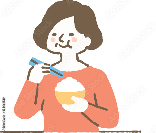 白米を食べている高齢女性_色