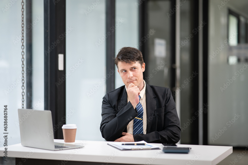 Businessman talking to customers online together at the office. Businessman talking to customers online together at the office.
