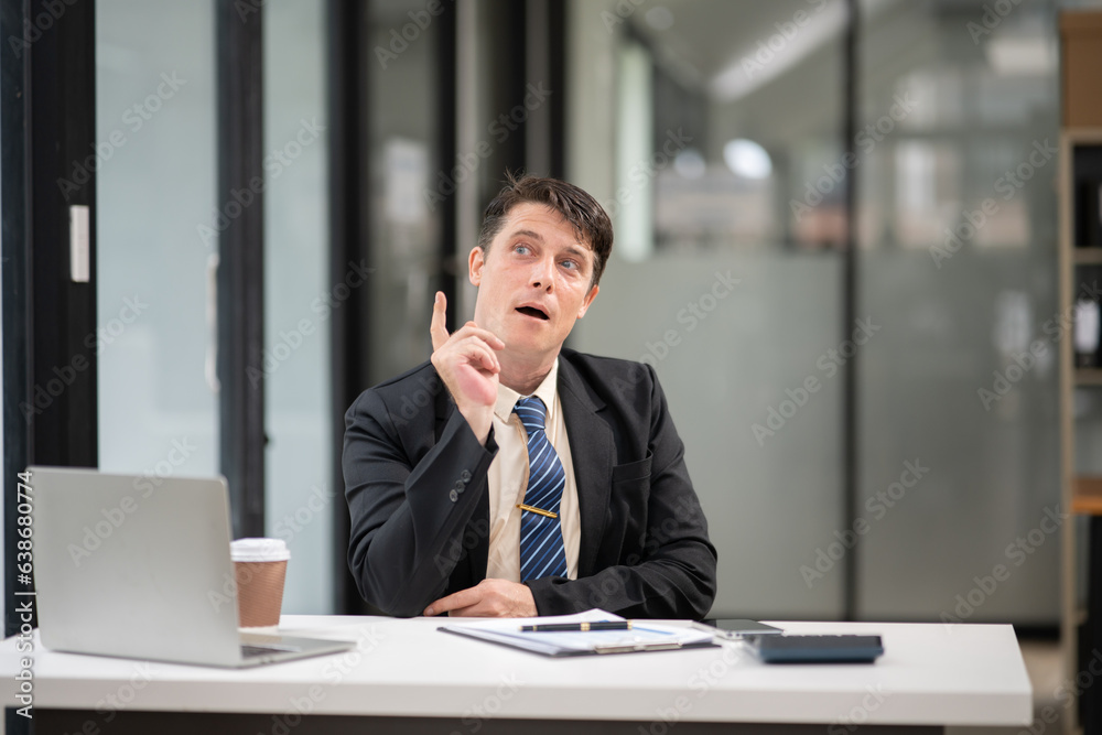 Businessman talking to customers online together at the office. Businessman talking to customers online together at the office.